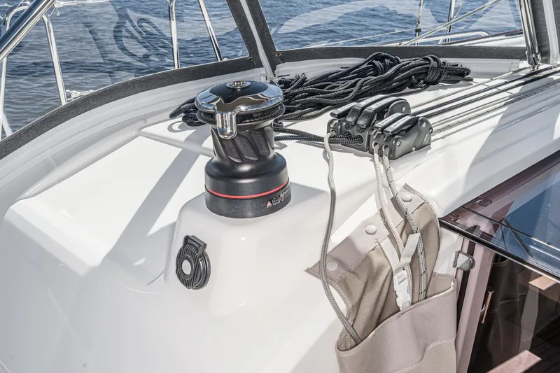 Slide: The Image of Deck equipment on 2025 Beneteau Oceanis 37.1 sailboat, featuring winch and rope management. - 78