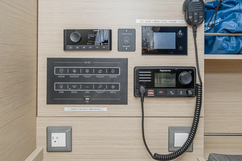 Slide: The Image of Control panel of 2025 Beneteau Oceanis 37.1 yacht with navigation and communication systems. - 8