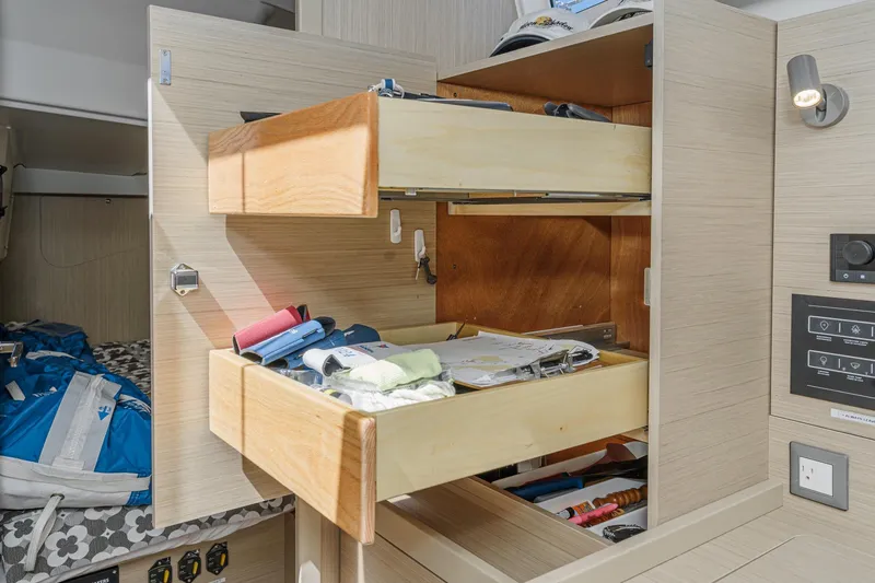 Slide: The Image of Interior storage drawers on the 2025 Beneteau Oceanis 37.1 yacht, showcasing organized space. - 9