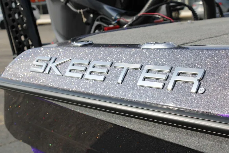 Slide: The Image of 2026 Skeeter ZXE21 boat with metallic finish and logo detail. - 6