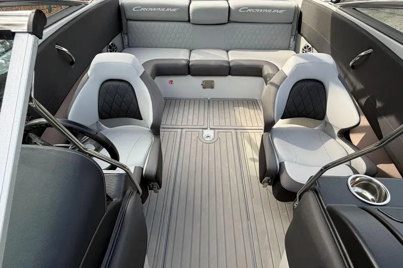 Slide: The Image of 2026 Crownline 240 SS boat interior with modern seating and sleek design. - 8