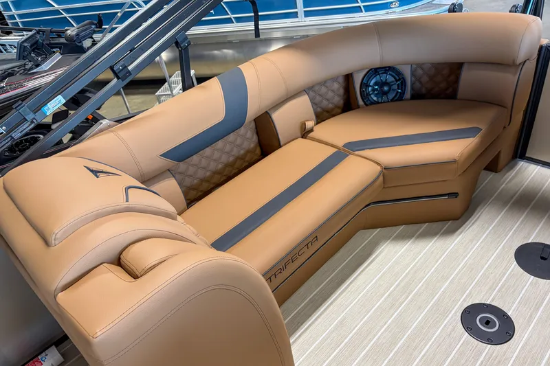 Slide: The Image of Luxurious seating on 2026 Trifecta 23 RF SS boat, featuring tan upholstery and modern design. - 14