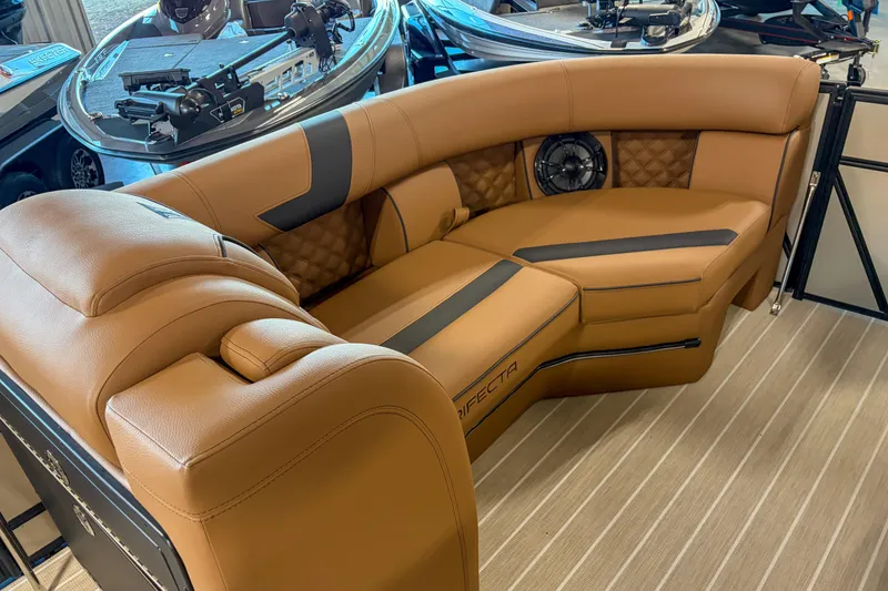 Slide: The Image of Luxurious seating on 2026 Trifecta 23 RF SS boat, featuring tan upholstery and modern design. - 6