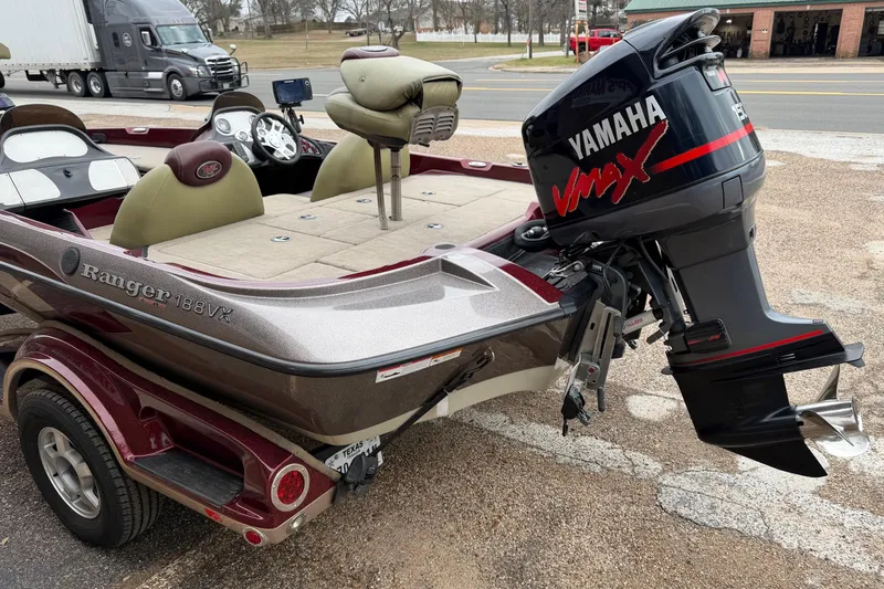 Slide: The Image of 2008 Ranger 188 VX boat with Yamaha VMAX outboard motor, parked on a trailer. - 8