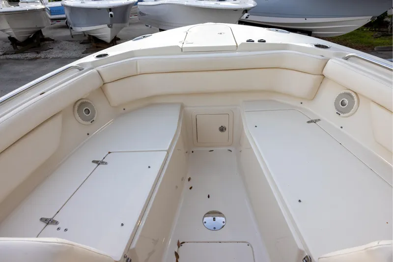 Slide: The Image of 2018 Grady-White Freedom 285 boat interior with spacious seating and storage compartments. - 16