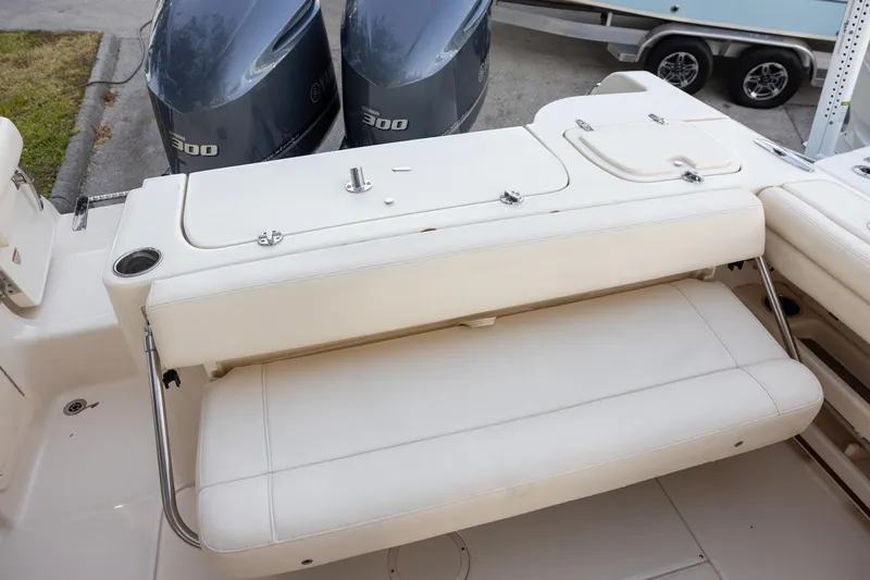 Slide: The Image of 2018 Grady-White Freedom 285 boat with dual Yamaha 300 engines and cushioned seating. - 8