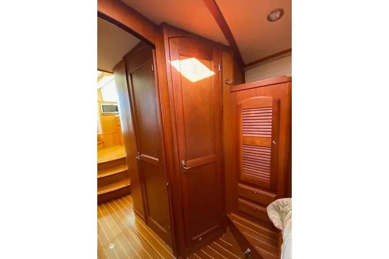 Slide: The Image of Interior of 2010 Sabre 38 Express yacht with wooden cabinetry and flooring. - 28