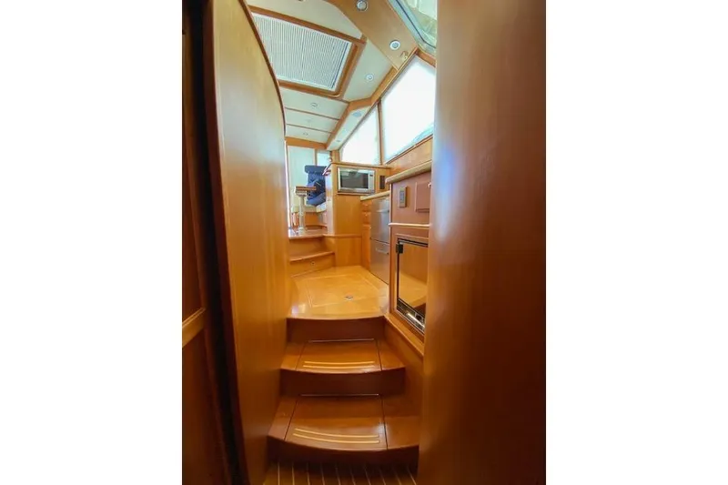 Slide: The Image of Interior of 2010 Sabre 38 Express yacht with wooden finishes and modern design. - 30