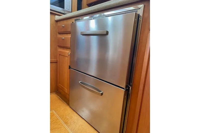 Slide: The Image of Stainless steel double-drawer refrigerator in 2010 Sabre 38 Express yacht kitchen. - 35