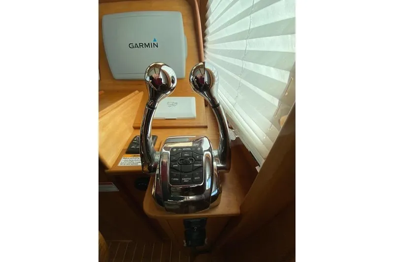 Slide: The Image of Control panel of 2010 Sabre 38 Express boat with Garmin navigation system. - 4