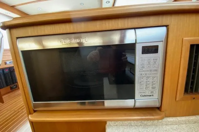 Slide: The Image of Cuisinart microwave in 2010 Sabre 38 Express yacht interior kitchen. - 42