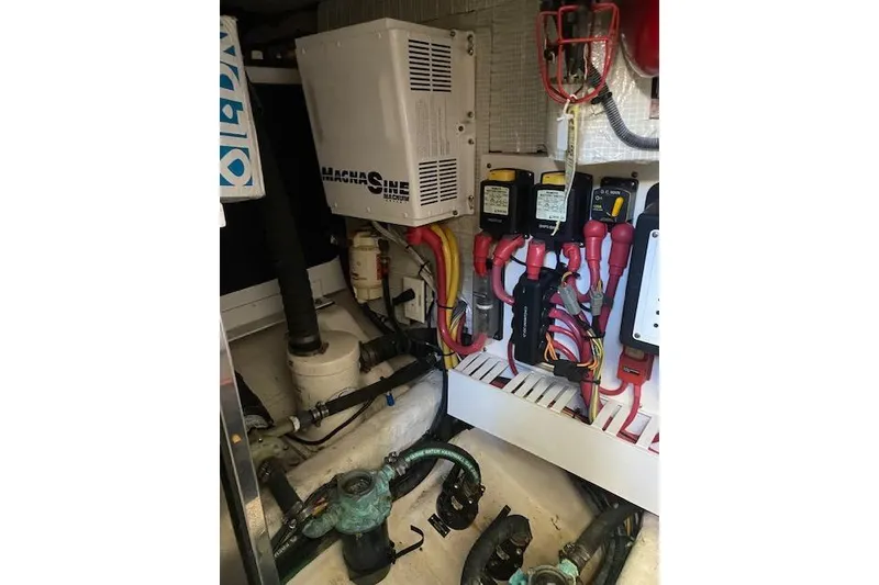 Slide: The Image of Engine room of 2010 Sabre 40 Sedan with electrical components and wiring. - 47