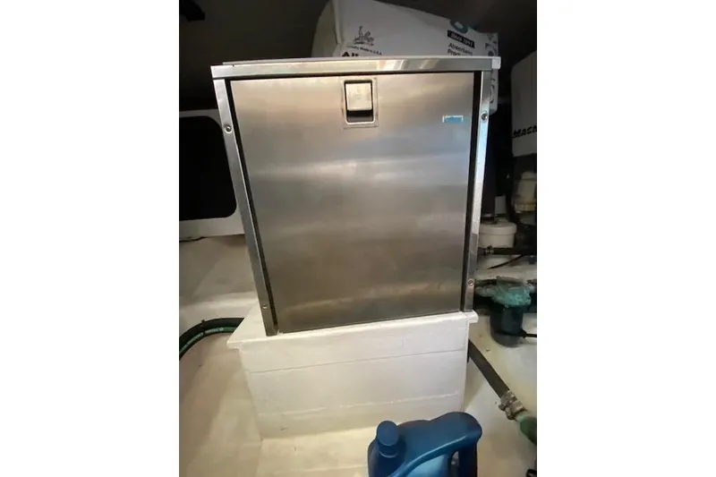 Slide: The Image of Stainless steel appliance in 2010 Sabre 40 Sedan boat interior. - 53