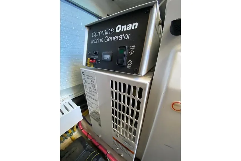 Slide: The Image of Cummins Onan marine generator in 2010 Sabre 40 Sedan yacht engine room. - 54