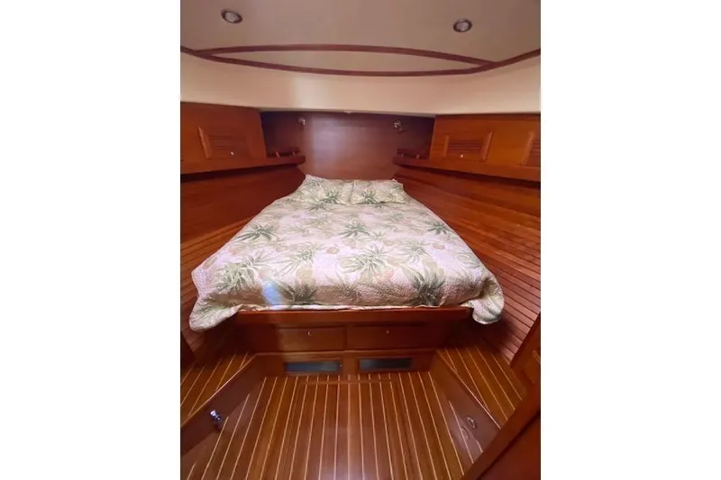 Slide: The Image of Luxurious wooden cabin interior of 2010 Sabre 38 Express yacht with cozy bed. - 6