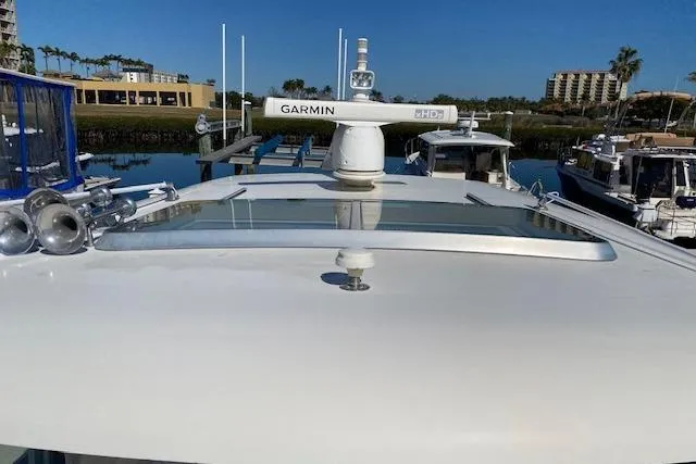 Slide: The Image of 2010 Sabre 40 Sedan yacht with Garmin radar, docked in a marina. - 71