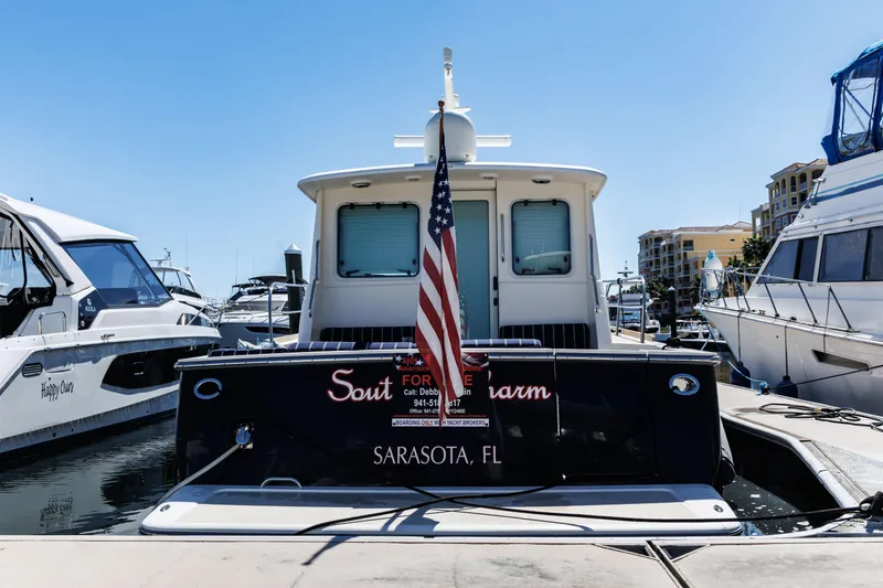 Slide: The Image of Electrical panel with circuit breakers and wiring on a 2010 Sabre 40 Sedan boat. - 83