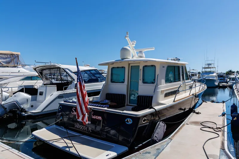 Slide: The Image of Electrical panel and wiring inside a 2010 Sabre 40 Sedan boat. - 85