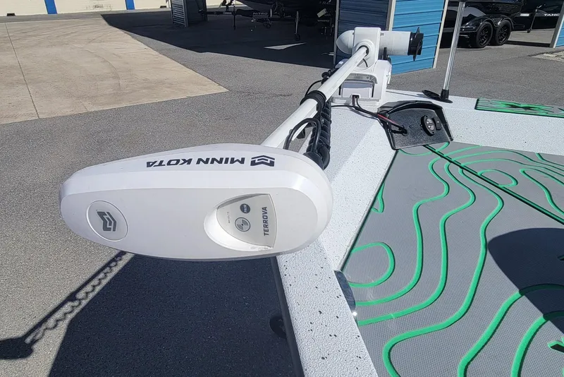 Slide: The Image of 2024 Xpress H22B Bay boat with Minn Kota Terrova trolling motor on deck. - 13