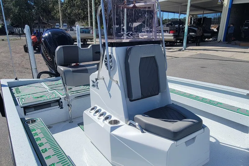 Slide: The Image of 2024 Xpress H22B Bay boat with sleek seating and modern design features. - 20