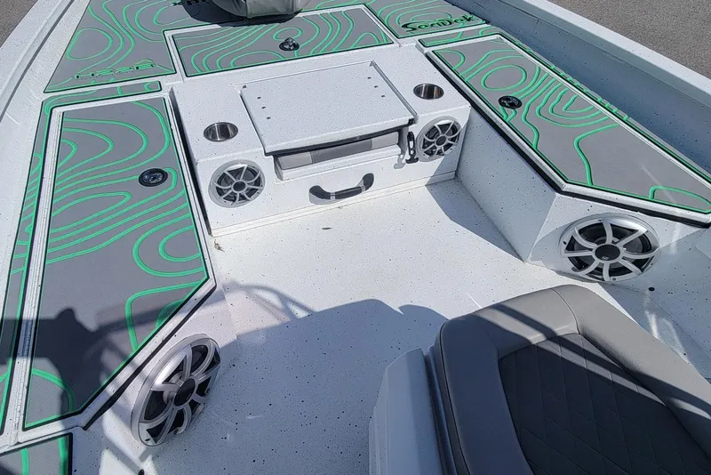 Slide: The Image of 2024 Xpress H22B Bay boat interior with stylish seating and integrated speakers. - 5