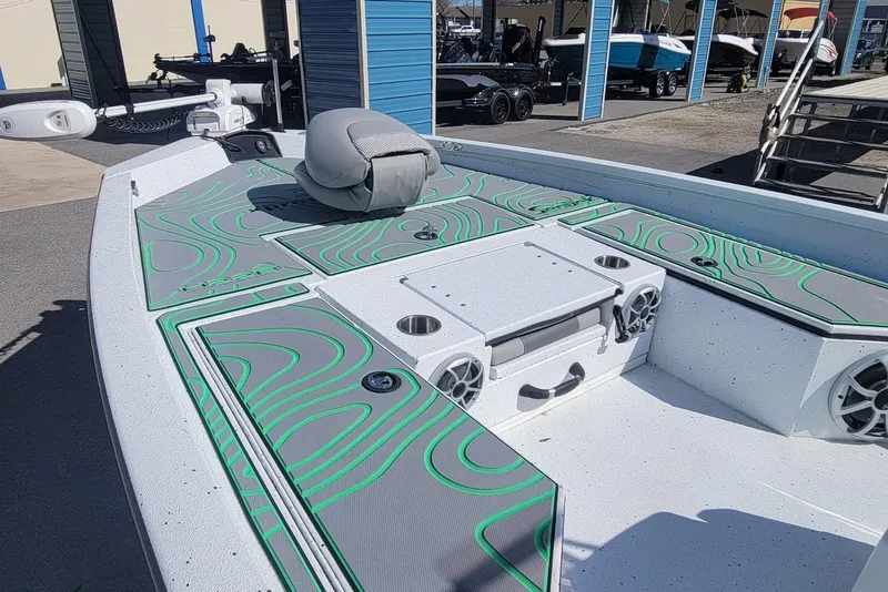 Slide: The Image of 2024 Xpress H22B Bay boat with stylish deck design and modern features. - 9