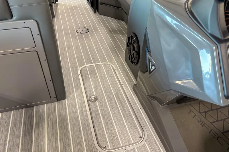 Slide: The Image of 2026 Trifecta 25 UL SS boat interior with sleek gray flooring and modern design. - 11