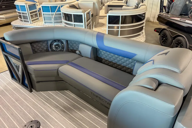 Slide: The Image of 2026 Trifecta 25 UL SS pontoon boat interior with luxurious seating and modern design. - 12
