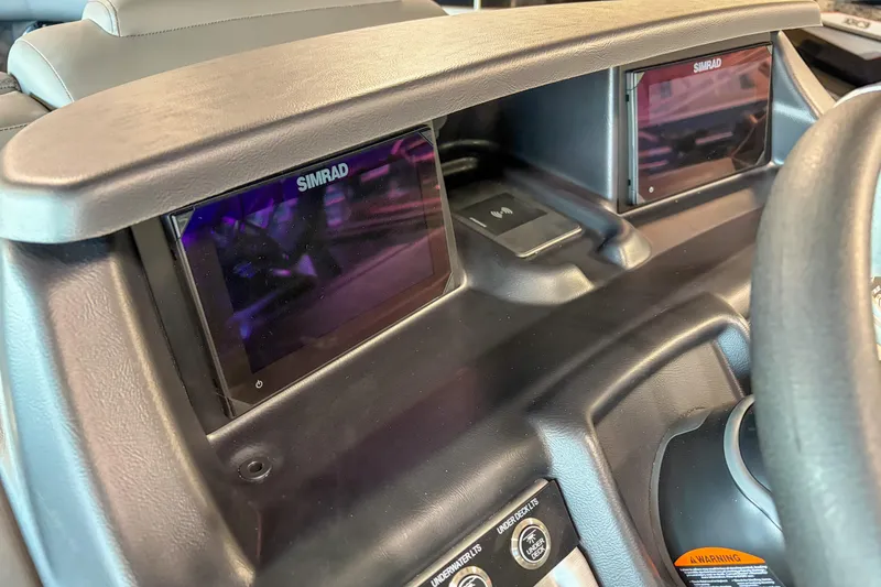 Slide: The Image of 2026 Trifecta 25 UL SS dashboard with dual Simrad displays and controls. - 7