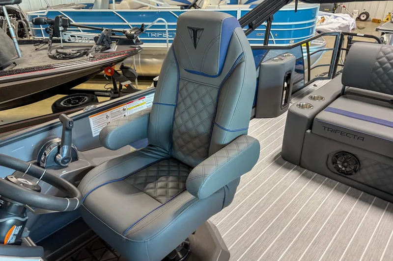 Slide: The Image of Luxurious interior of 2026 Trifecta 25 UL SS pontoon boat with premium seating. - 9