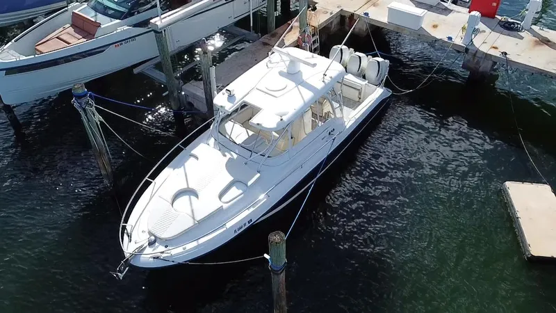 Slide: The Image of 2006 Hydra-Sports Vector 3300 VX boat docked at marina, aerial view. - 10