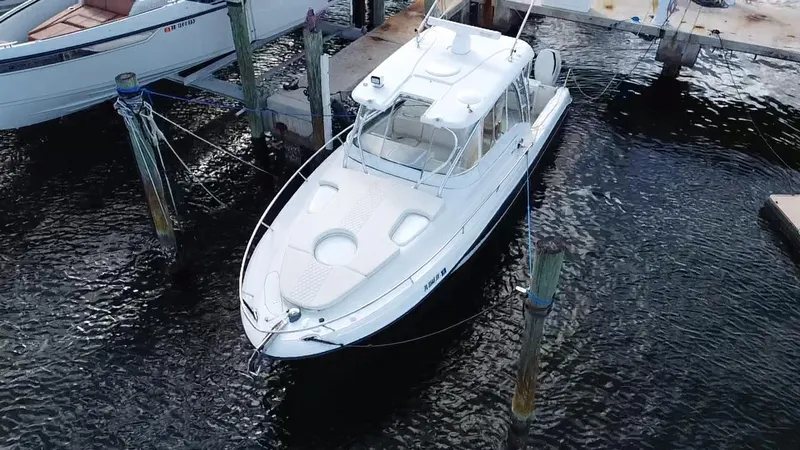 Slide: The Image of 2006 Hydra-Sports Vector 3300 VX boat docked in marina, aerial view. - 4