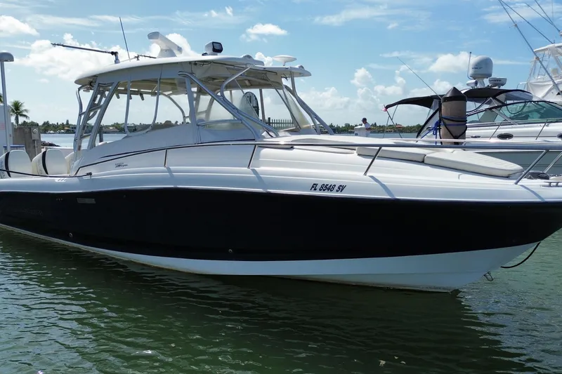 The Image of 2006 Hydra-Sports Vector 3300 VX boat docked on a sunny day. - 0