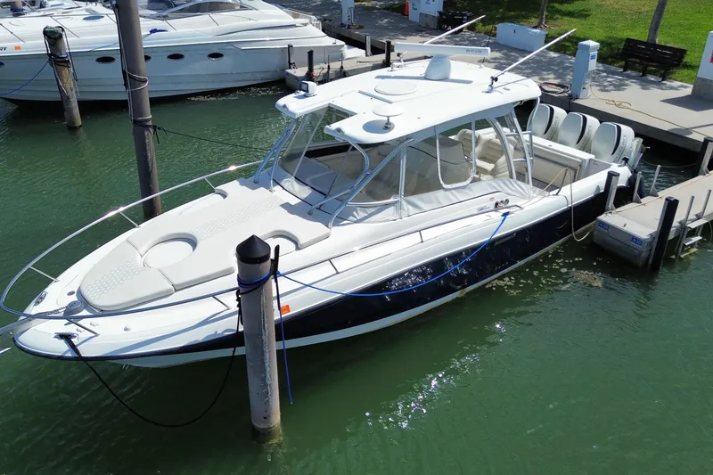 Slide: The Image of 2006 Hydra-Sports Vector 3300 VX boat docked in marina, side view. - 8