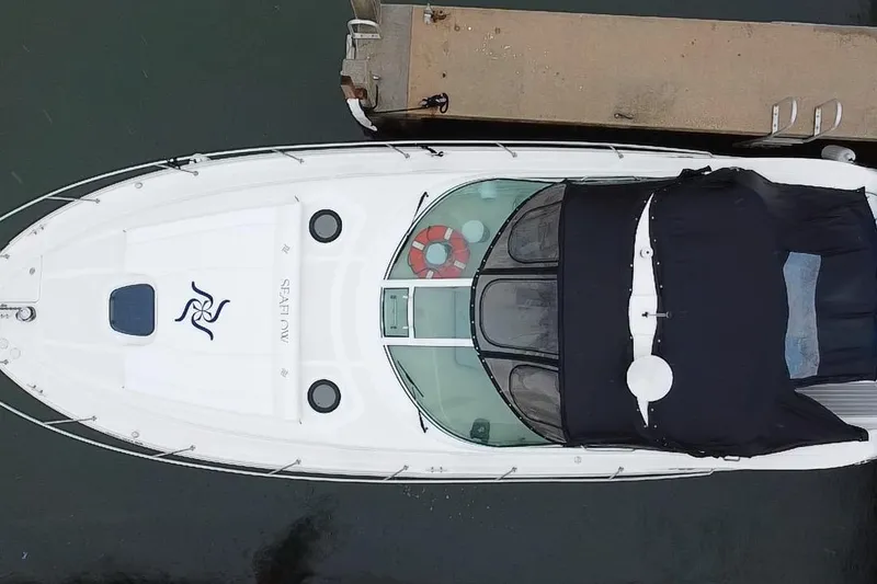 Slide: The Image of Top view of a 2004 Sea Ray 340 Sundancer docked at a pier. - 28
