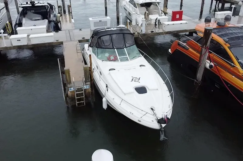 Slide: The Image of 2004 Sea Ray 340 Sundancer docked at marina, aerial view. - 5