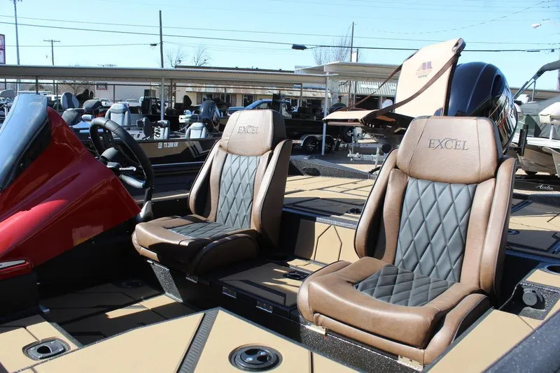 Slide: The Image of 2026 Excel EX 183 boat interior with leather seats and modern design. - 6