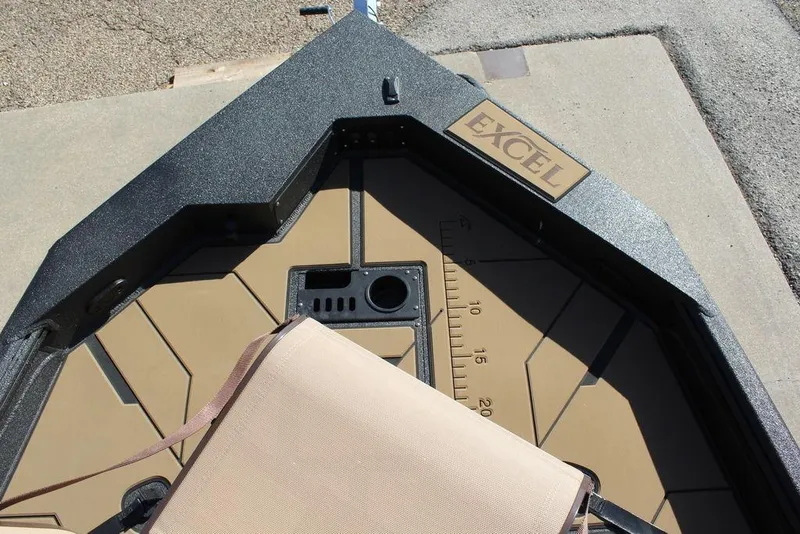 Slide: The Image of Bow of Excel EX 183 boat, 2026 model, with measuring ruler and storage compartments. - 7