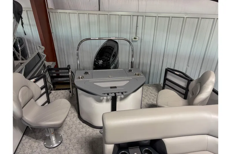 Slide: The Image of 2026 Trifecta 22 TRFC LE boat interior with seating and control panel. - 11