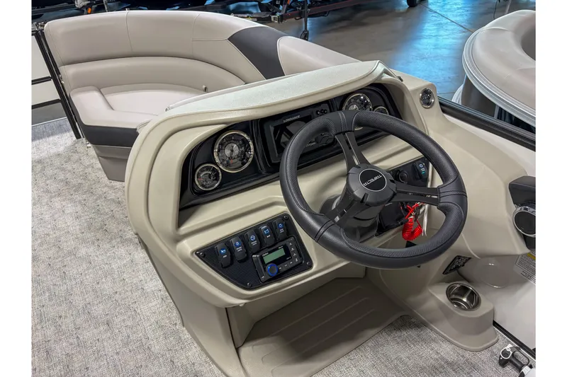 Slide: The Image of 2026 Trifecta 22 TRFC LE boat dashboard with steering wheel and control panel. - 9