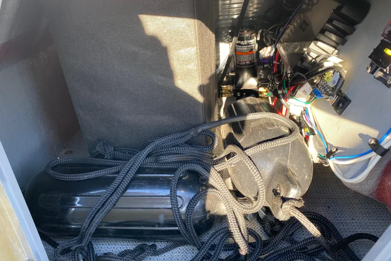 Slide: The Image of Interior view of 2022 Manitou 25 OASIS RF SHP boat with ropes and equipment. - 26