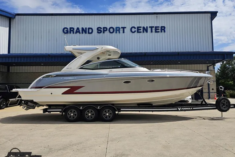The Image of 2020 Formula 330 Crossover Bowrider on trailer at Grand Sport Center. - 1