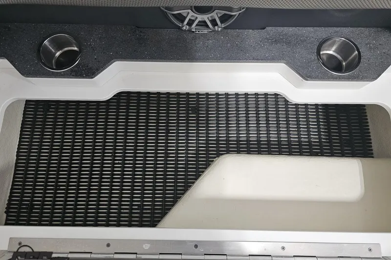 Slide: The Image of Interior of 2020 Formula 330 Crossover Bowrider with cup holders and non-slip flooring. - 101