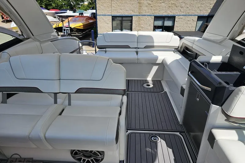 Slide: The Image of 2020 Formula 330 Crossover Bowrider interior with luxurious seating and modern amenities. - 102