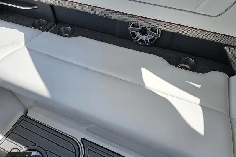 Slide: The Image of 2020 Formula 330 Crossover Bowrider interior with white seating and cup holders. - 104