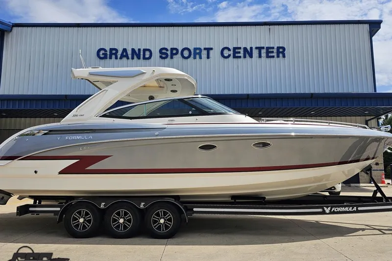 Slide: The Image of 2020 Formula 330 Crossover Bowrider boat at Grand Sport Center, on trailer. - 4