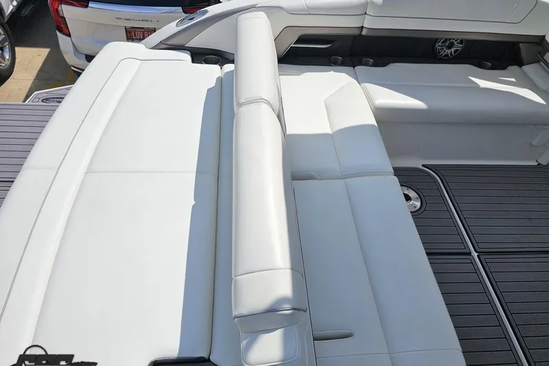 Slide: The Image of 2020 Formula 330 Crossover Bowrider interior with white seating and sleek design. - 45