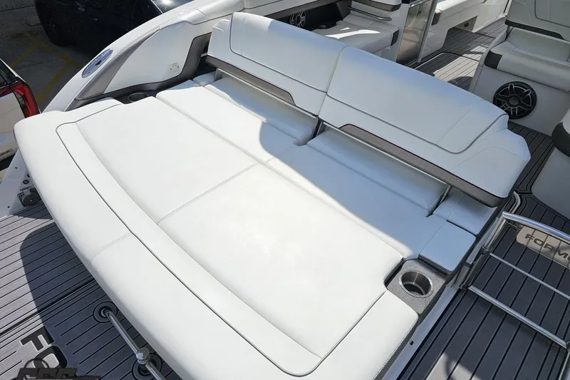 Slide: The Image of 2020 Formula 330 Crossover Bowrider with spacious white seating and cup holders. - 46
