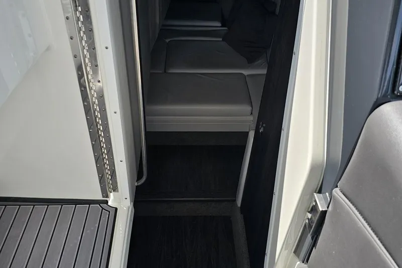 Slide: The Image of Interior view of 2020 Formula 330 Crossover Bowrider cabin with seating area. - 70