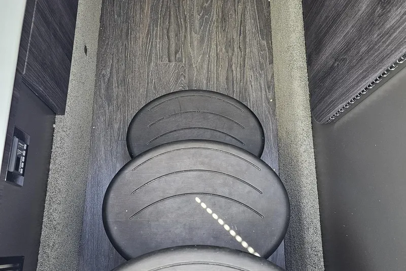 Slide: The Image of Interior steps of 2020 Formula 330 Crossover Bowrider with dark wood finish. - 71